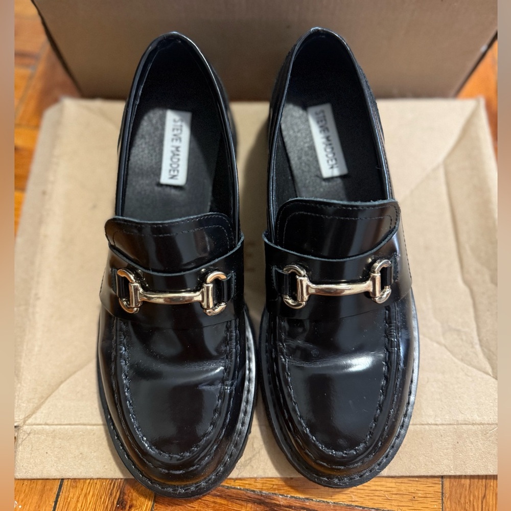 Steve Madden Glossy Black Loafers with Gold Accent